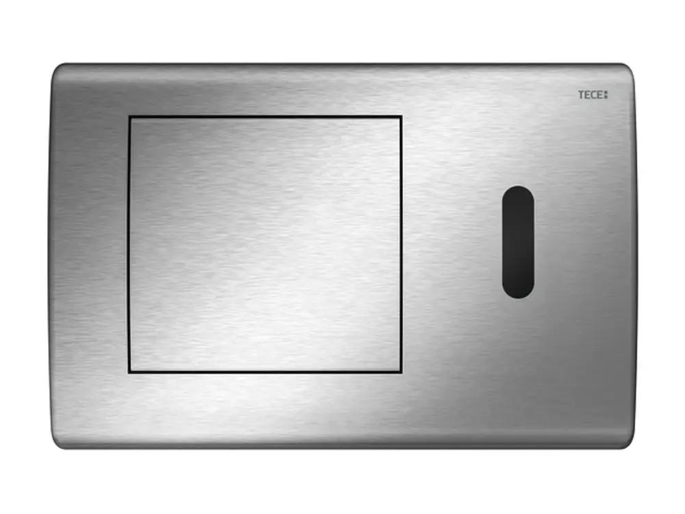 TECE WC-Elektronik mit IR-Sensor in Edelstahloptik. Die Steuerung ist flach und rechteckig gestaltet, mit einem Sensor auf der rechten Seite.